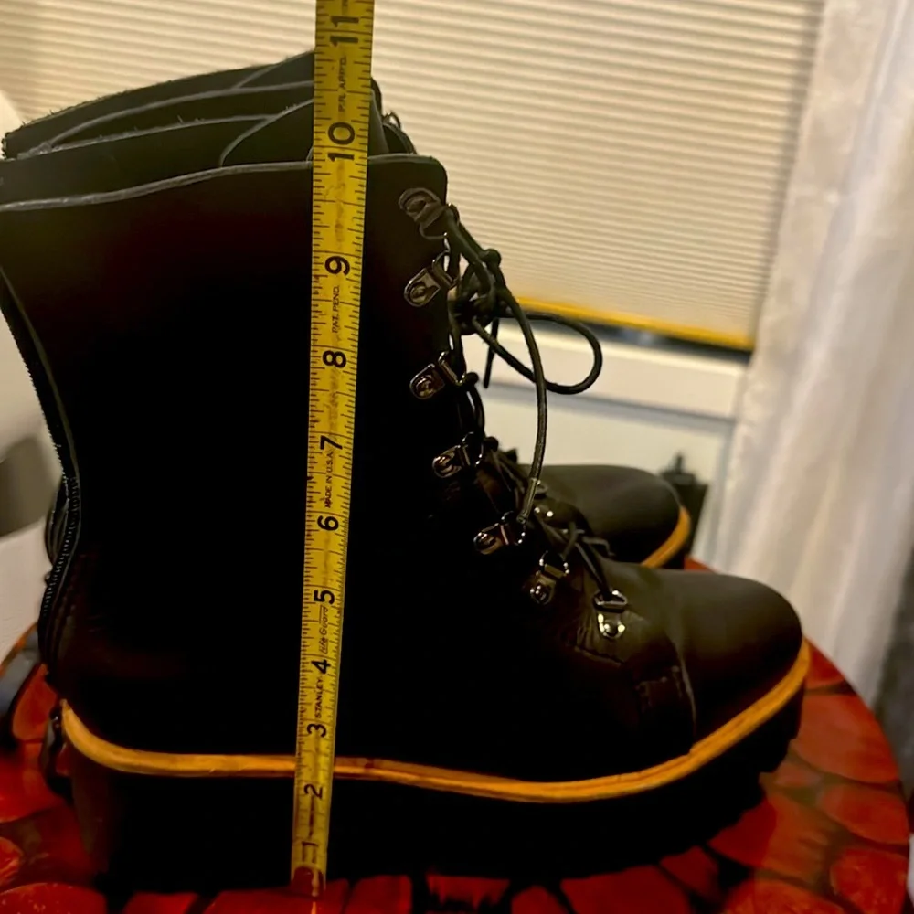 Absolutely gorgeous ALL BLACK platform Boots like new!